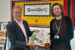 Summer Reading Challenge book donation with Joseph Moseley, Information and Stock Advisor at Rugby Library