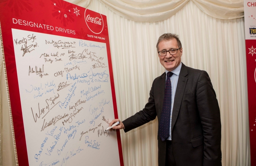 Mark Pawsey signs the THINK! Driving pledge