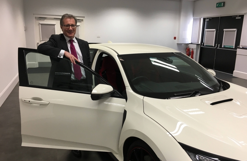 Rugby MP Mark Pawsey with a Honda Civic built at their factory in Swindon