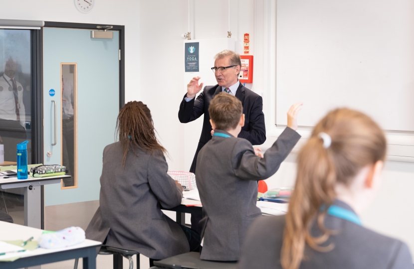 Rugby MP Mark Pawsey speaking to pupils at Houlton School