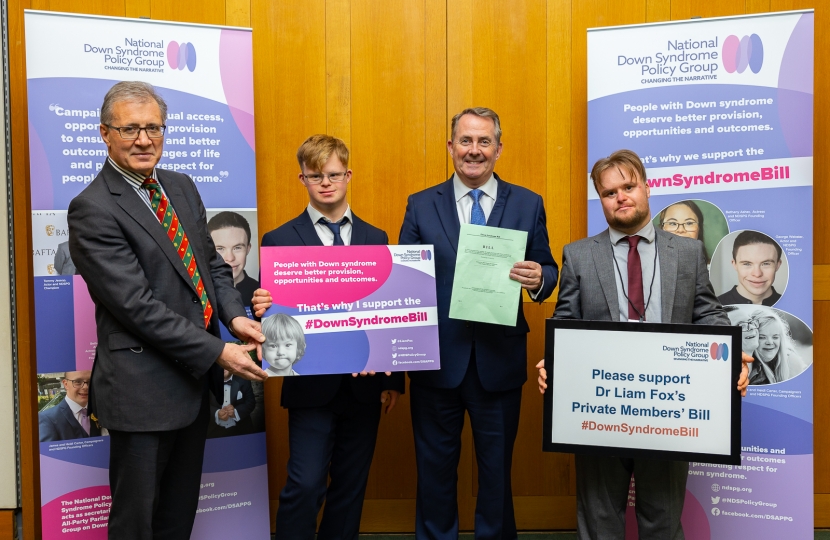Rugby MP Mark Pawsey (left) with Dr Liam Fox MP (centre) and members of the National Down Syndrome Policy Group ahead of the Bill being debated in Parliament