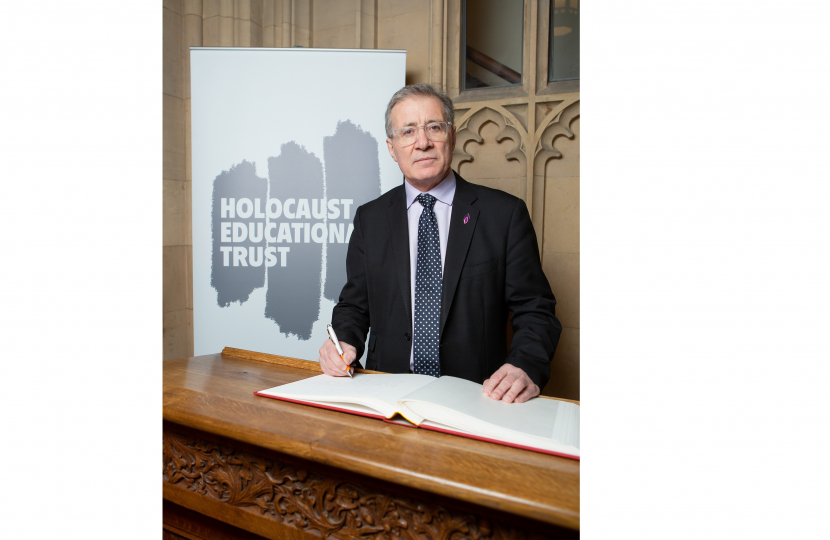 Rugby MP Mark Pawsey signs the Holocaust Education Trust’s Book of Commitment