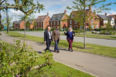Rugby MP Mark Pawsey (centre) is shown around Houlton by Richard Coppell, Group Development Director for Urban&Civic (left) and Joh Thomas, Communities, Communications and Partnerships for Urban&Civic (right)