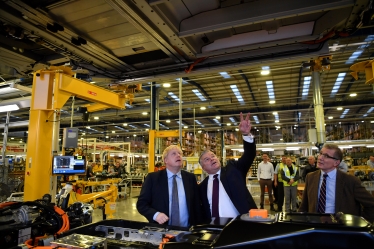 Rugby MP Mark Pawsey (right) with the Prime Minister, Boris Johnson MP, and Joerg Hofmann, CEO of the London Electric Vehicle Company (LEVC) at the LEVC factory in Ansty, Rugby