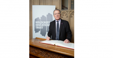 Rugby MP Mark Pawsey signs the Holocaust Education Trust’s Book of Commitment